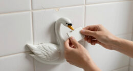 She Used A Ceramic Swan To Hide This Major Bathroom Eyesore